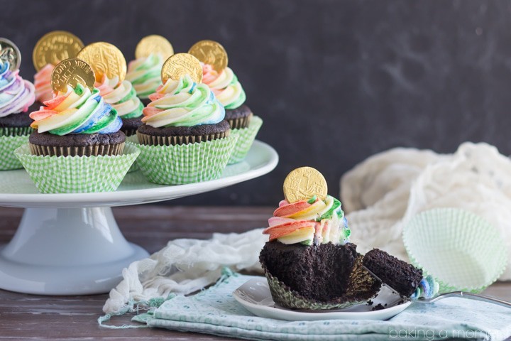 Rainbow Pot of Gold Cupcakes for St. Patrick's Day- the Chocolate Cake recipe is phenomenal! And the Rainbow striped frosting was actually pretty simple. Definitely making these again, they were a big hit! width=