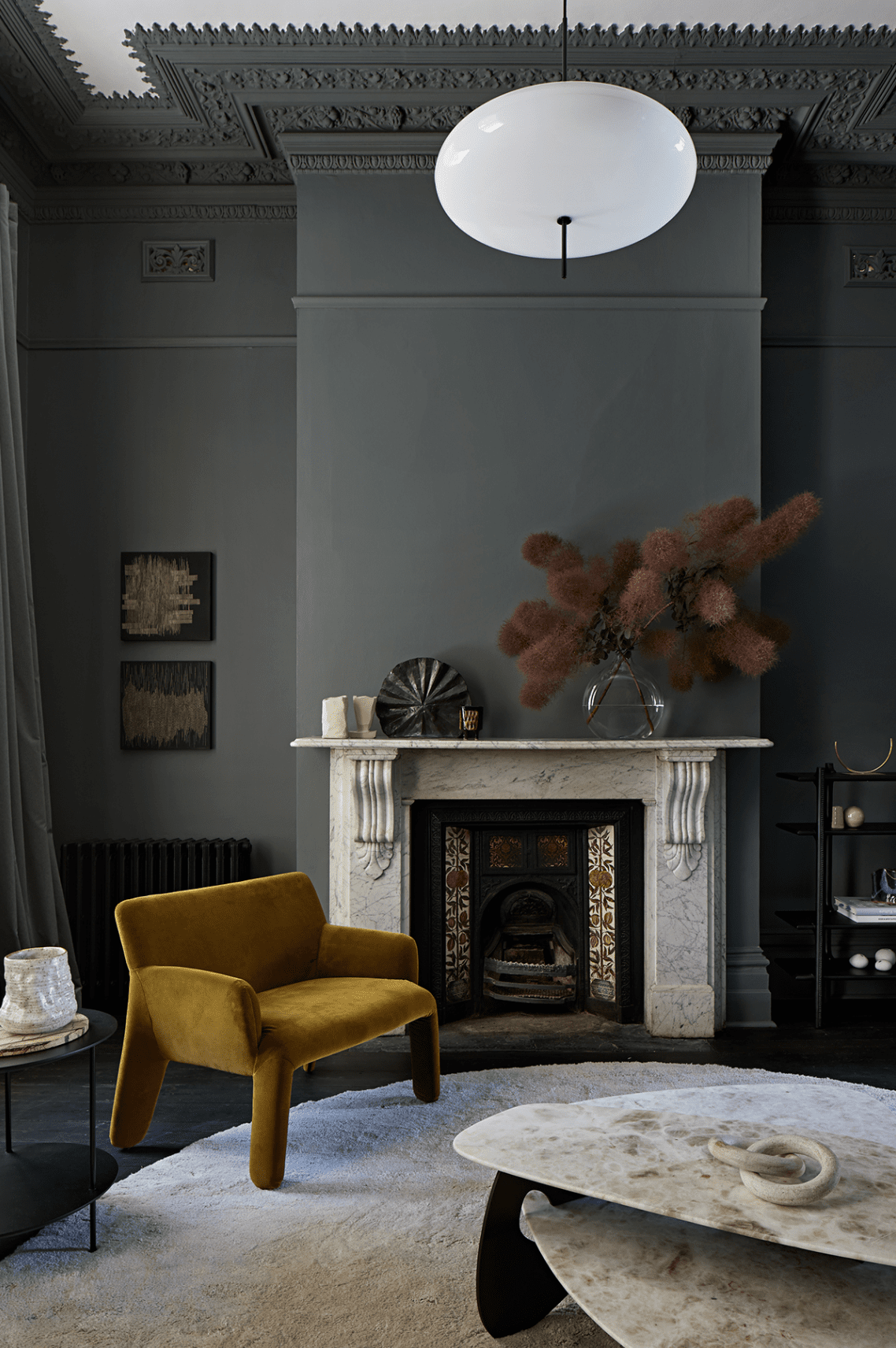 Dark interior with a wood panelled kitchen - via Coco Lapine Design blog