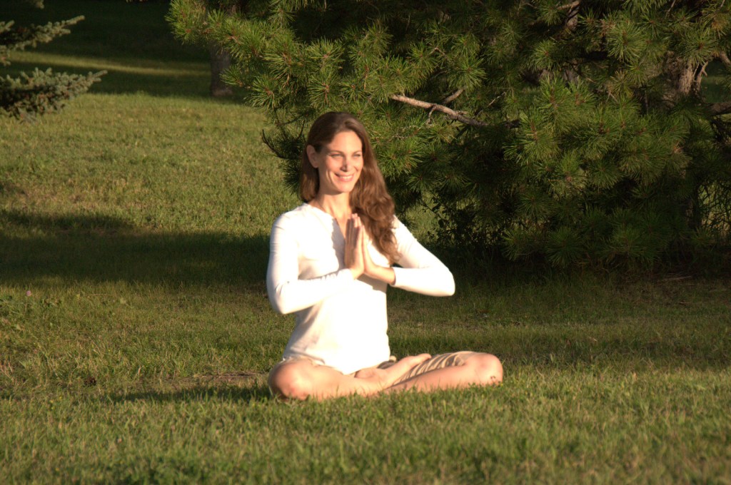 green grass namaste Christine Wushke