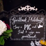 Handwritten chalkboard guestbook photobooth sign at wedding