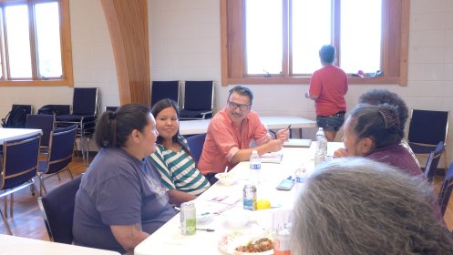 Christoph Korner of Graft Architects talks with women from the Fort Peck Tribes.