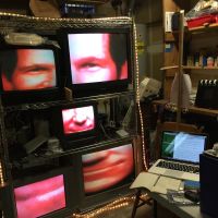 Jeremy Noonans Wizard Wall tasks five RPis and Pi cameras to segment a different part of a users face to five separate monitors for one big image collage.