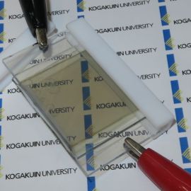 Transparent battery charges devices with the power of the sun