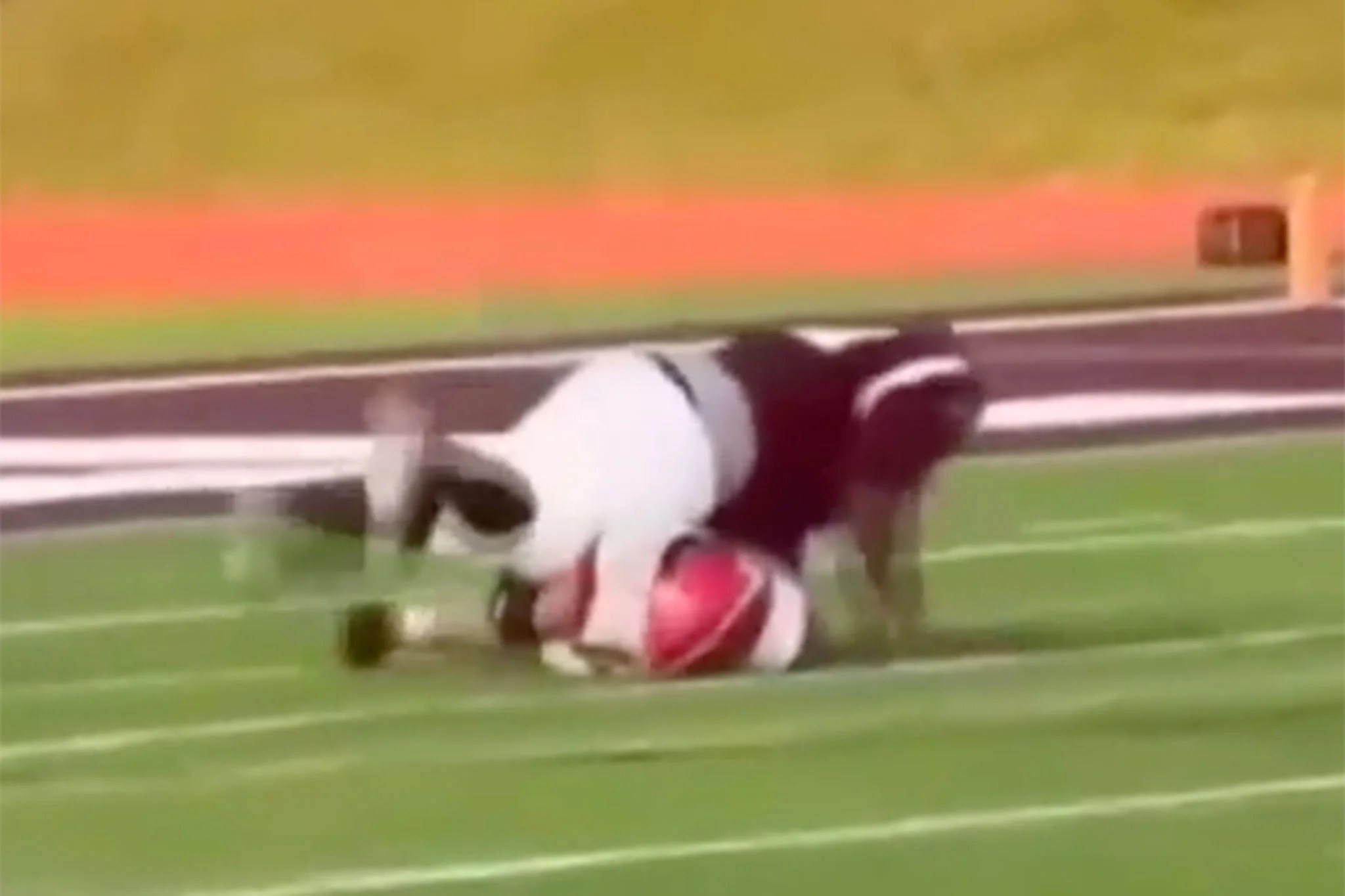 High school football player left with broken spine as opponent jumps on him in unsportsmanlike move High school football player left with broken spine as opponent jumps on him in unsportsmanlike move
