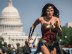 This image released by Warner Bros. Pictures shows Gal Gadot as Wonder Woman in a scene from "Wonder Woman 1984." The film isn’t skipping theaters or moving to 2021, but it is altering course. The last big blockbuster holdout of 2020 is still opening in U.S. theaters on Christmas Day but it will also be made available to HBO Max subscribers free of charge for its first month, Warner Bros. said Wednesday, Nov. 18, 2020. (Clay Enos/Warner Bros Pictures via AP)