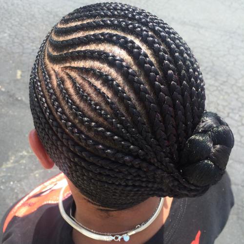 Asymmetrical Cornrows With Side Bun