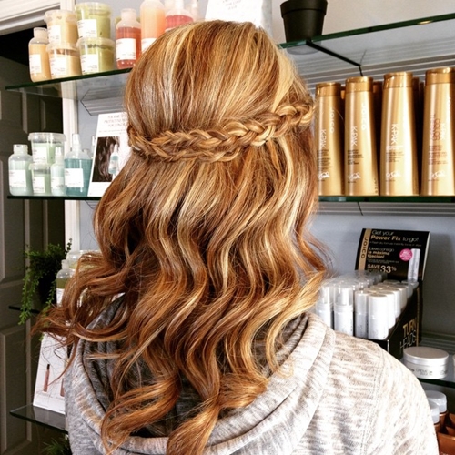 wavy half up half down hairstyle with a braid