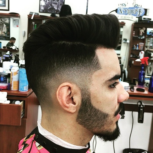 mens faux hawk with side and back fade