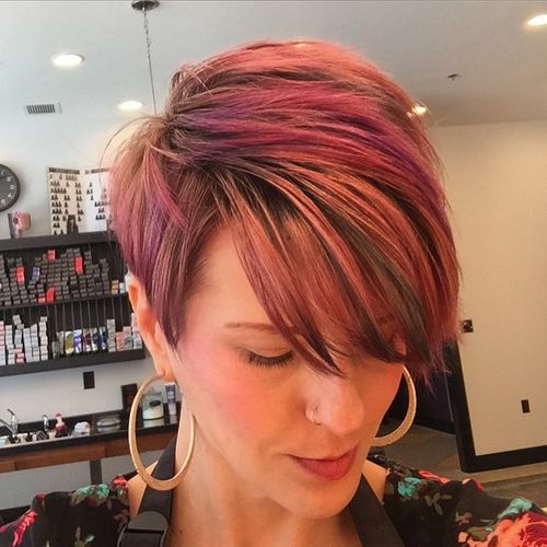 pastel red pixie with long bangs
