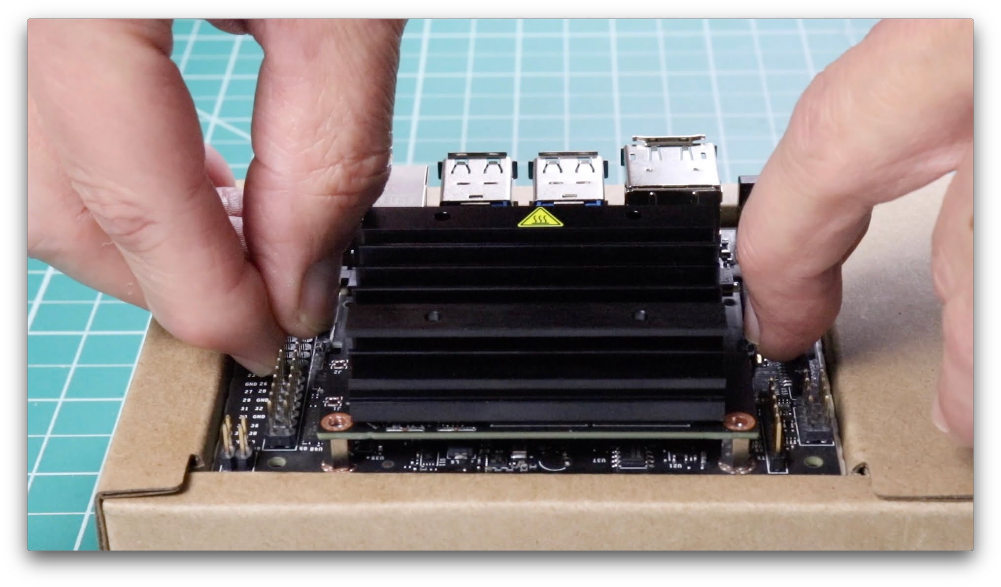 Release latches which hold the module in place.