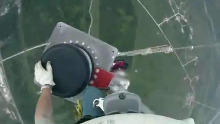 This Guy Climbs 1768 Feet to Change a Light Bulb