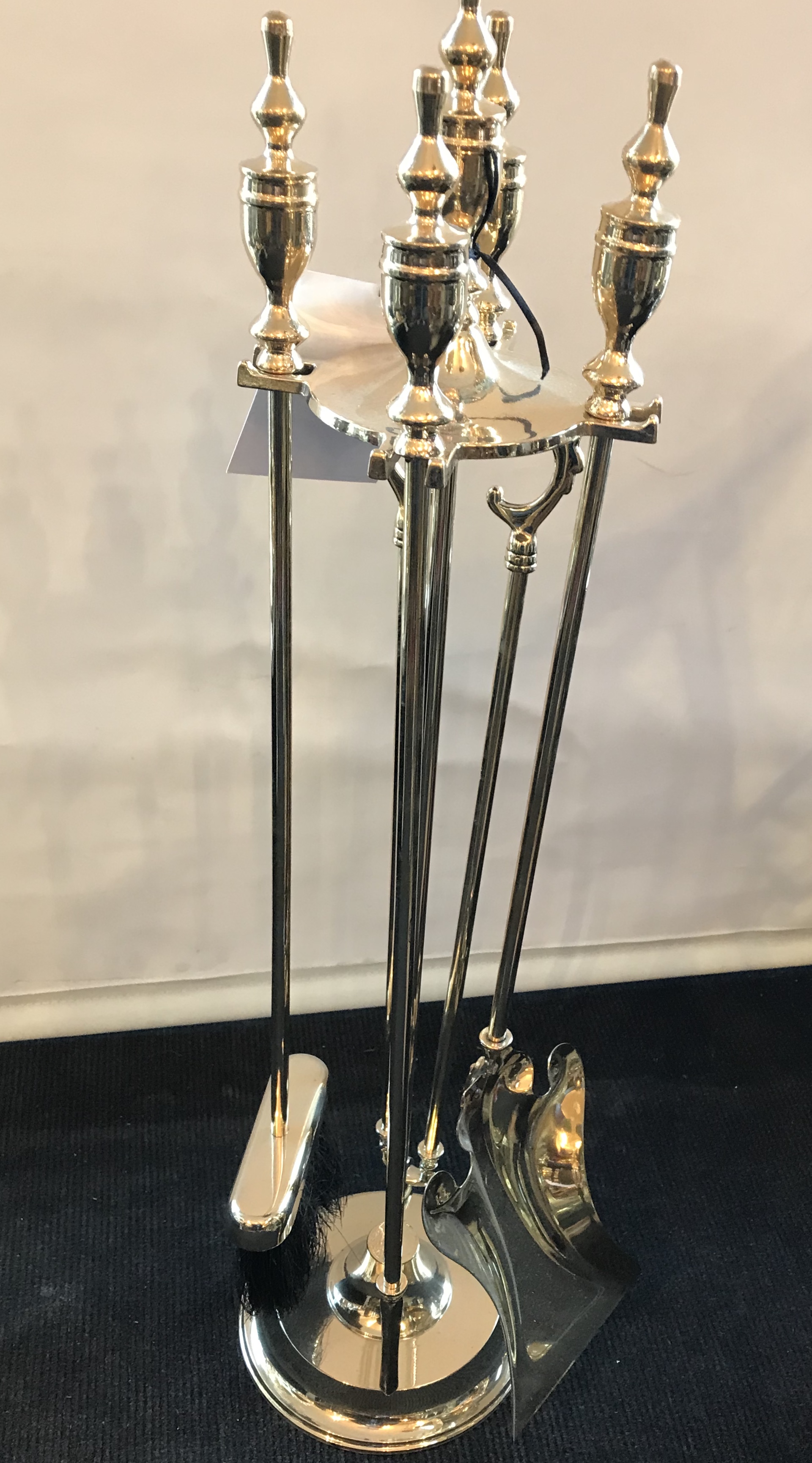 A brass set of four fire irons on stand Brian Behan Antique Galleries