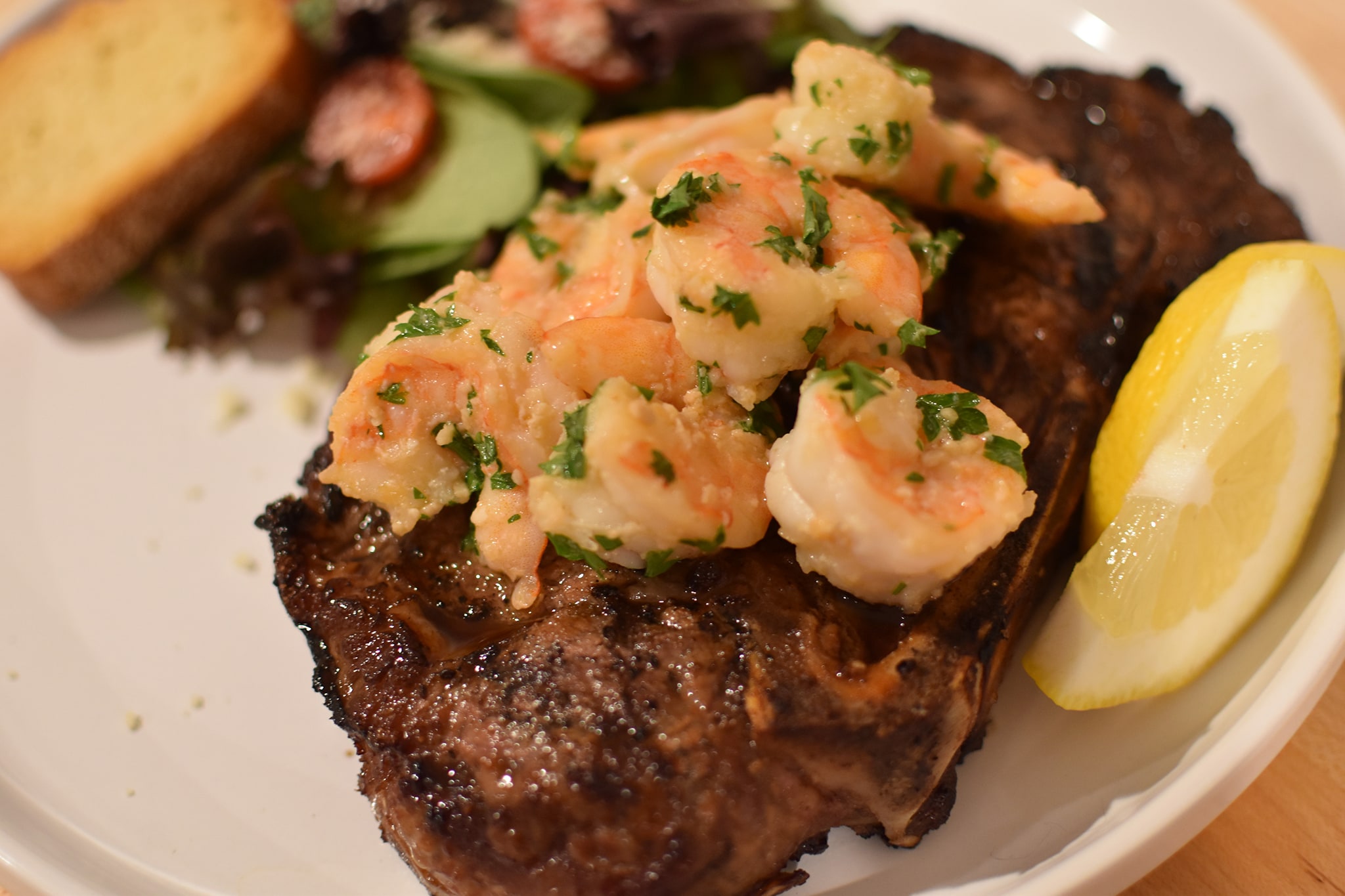 Garlic Butter Grilled New York Strip with Zesty Shrimp Scampi