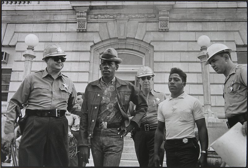 Selma, Alabama. Sheriff Jim Clark arrests two young men demonstrating