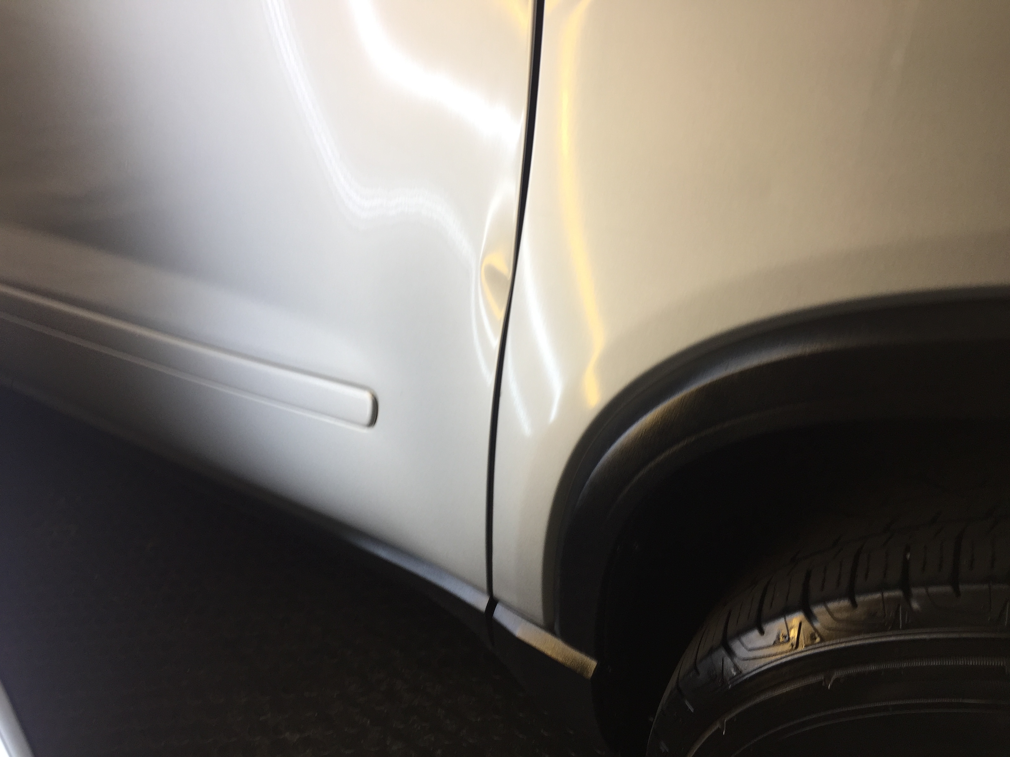 2012 GMC Acadia Door Edge Dent Removal Taylorville, IL Paintless