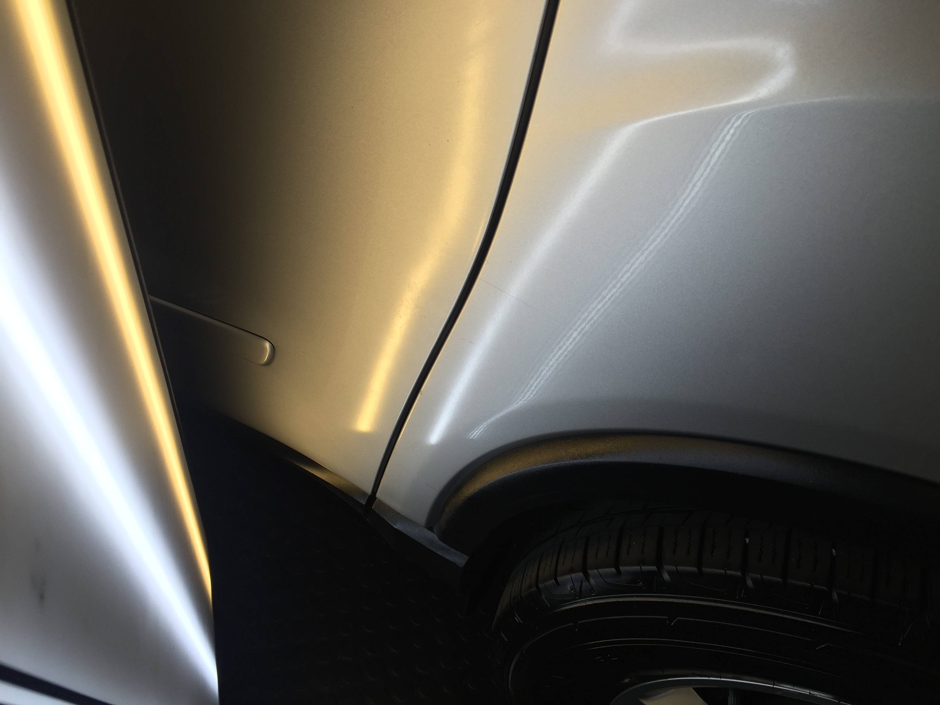 2012 GMC Acadia Door Edge Dent Removal Taylorville, IL Paintless