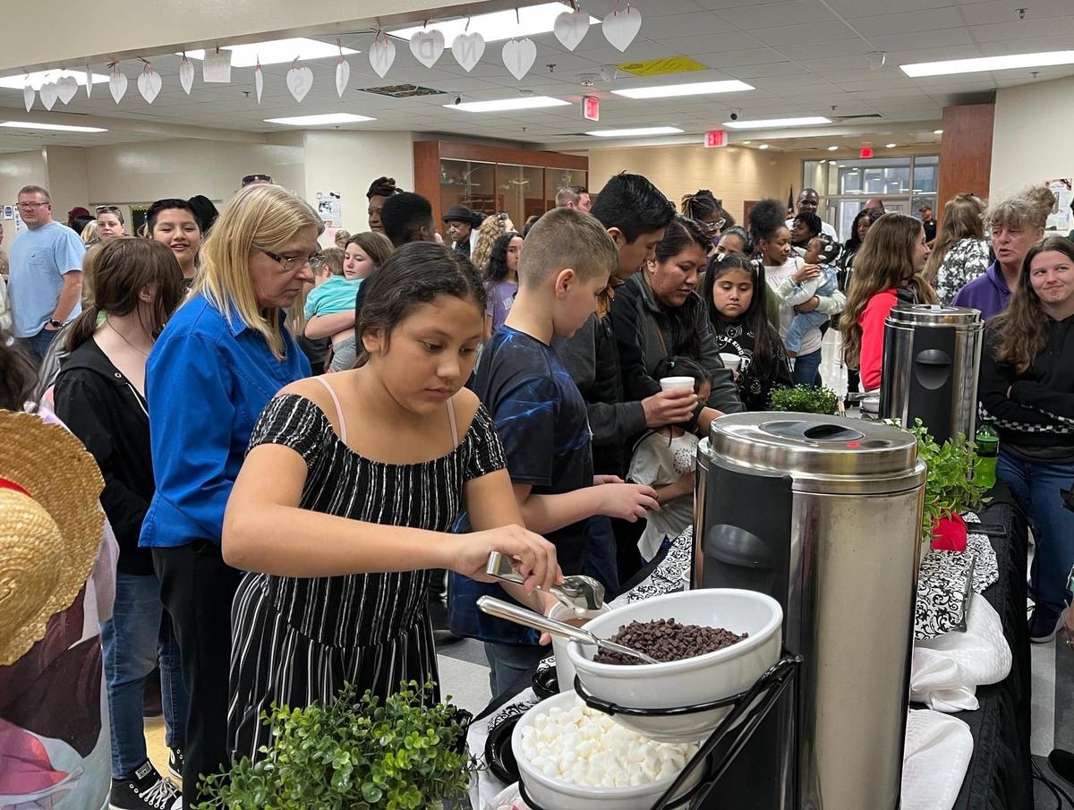 Families enjoy student projects at Winter Gallery Walk Pine Ridge