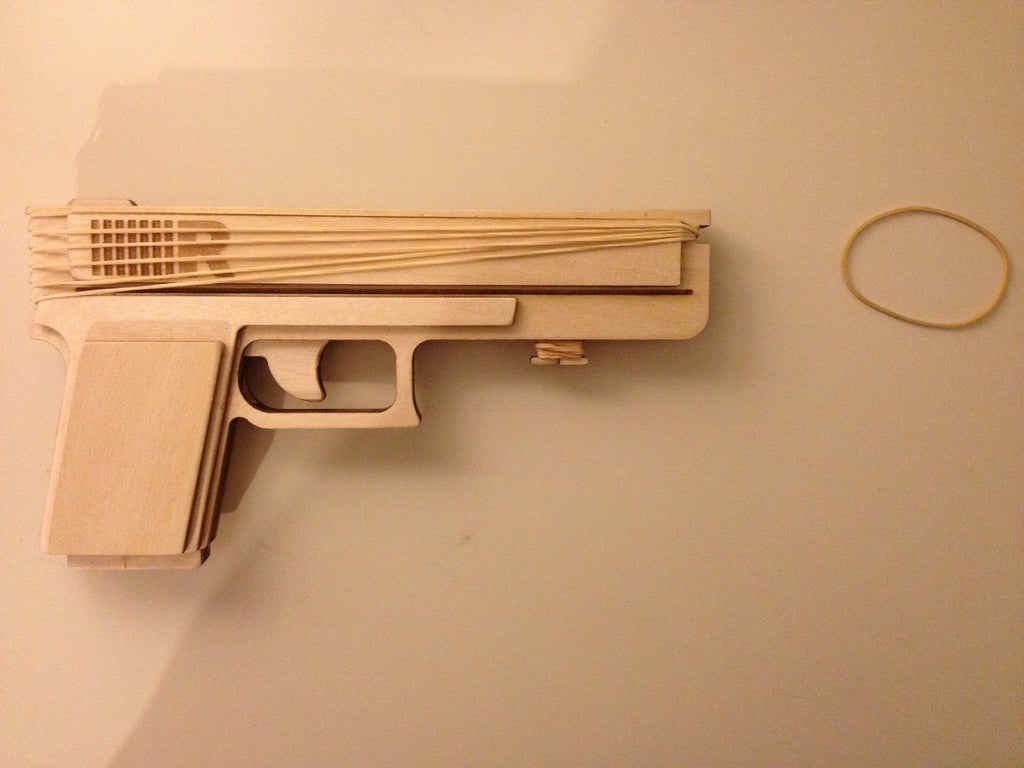 Laser Cut Semiautomatic Rubber Band Gun Illustration (.ai) vector file free download 3axis.co