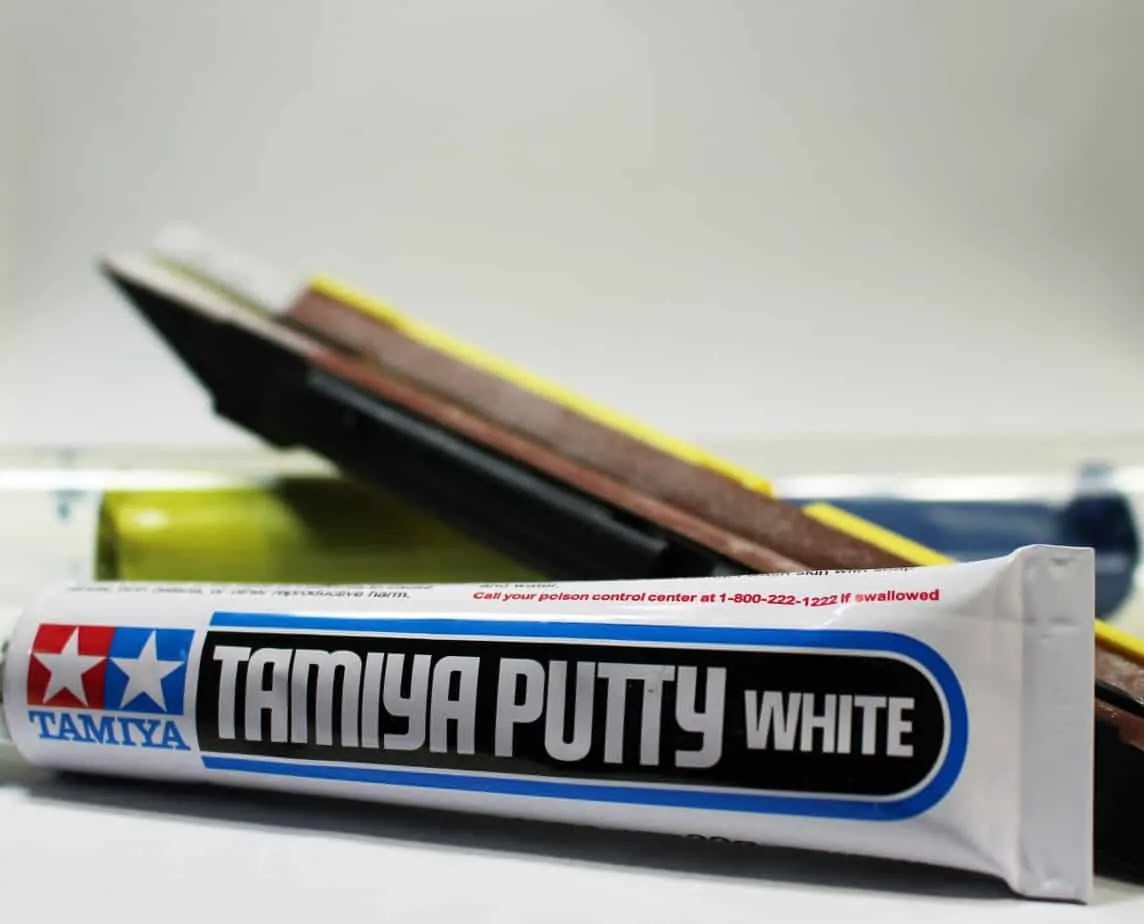 Tamiya putty, green epoxy, and sanding sticks for finishing 3D printed