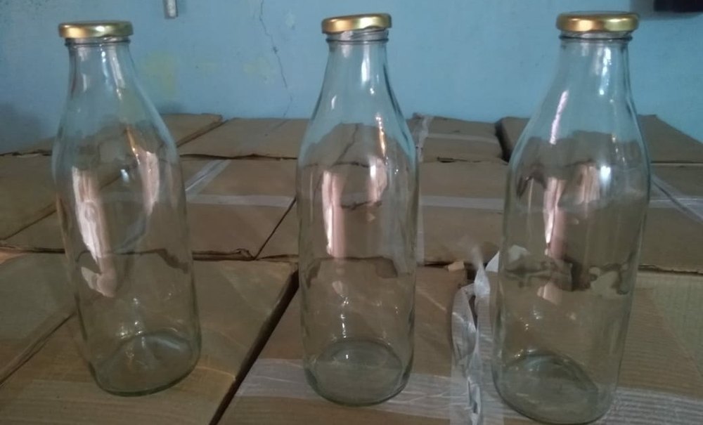 Lug Round Shape Empty Glass Bottles for Milk 1000 ml at Rs 20/piece