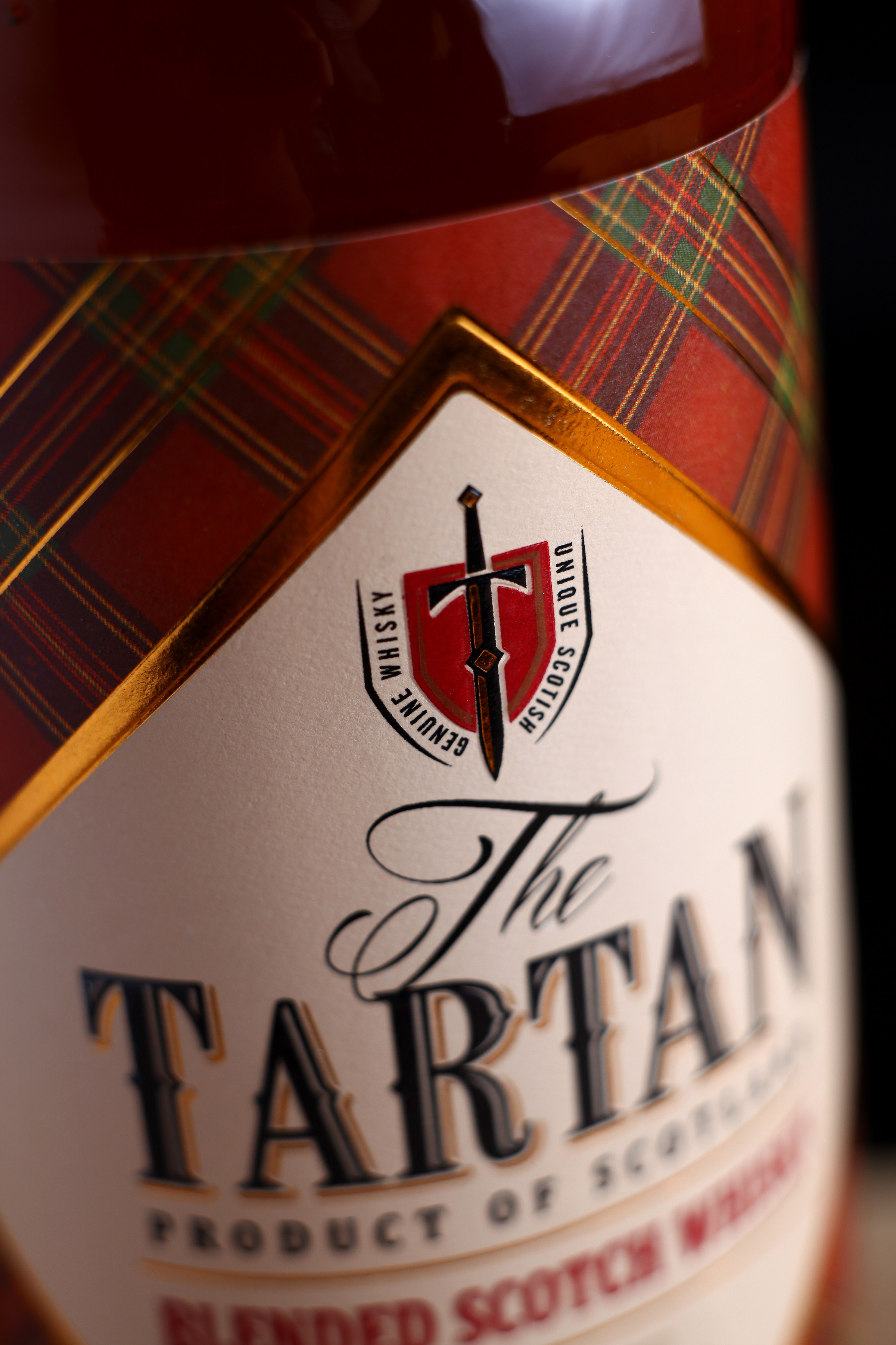Label design of the Scotch whiskey “Tartan” 43'oz Design Studio