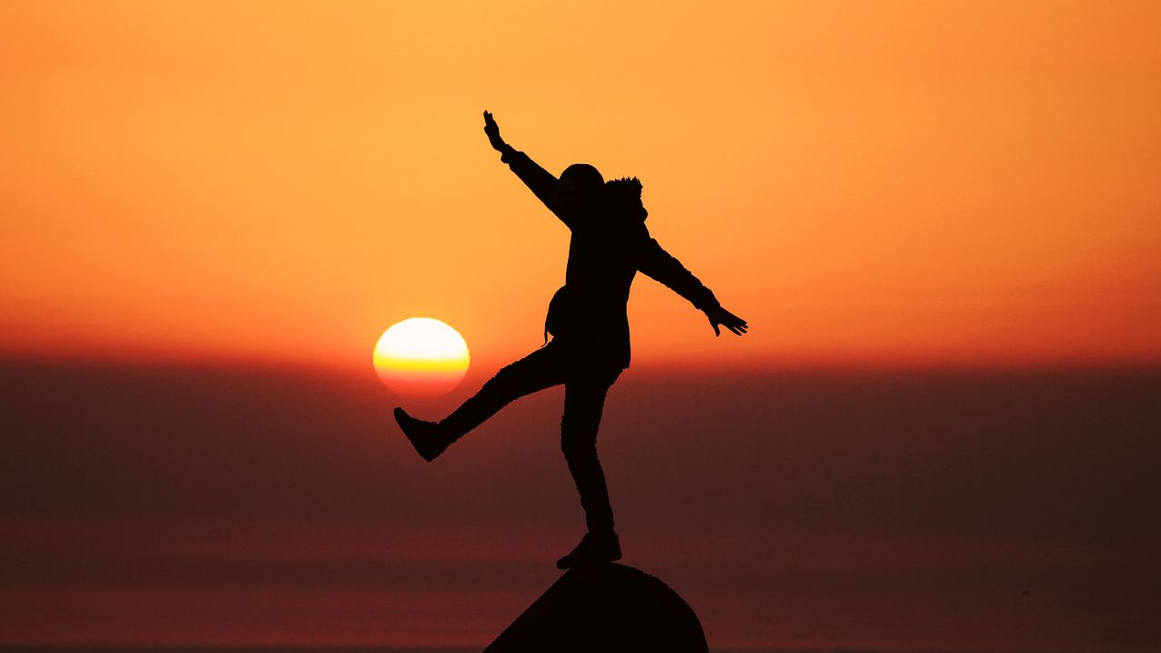 Silhouette 4K Wallpaper, Person, Balance, Sunset, Orange Sky, Dawn, Standing, Rock, 5K