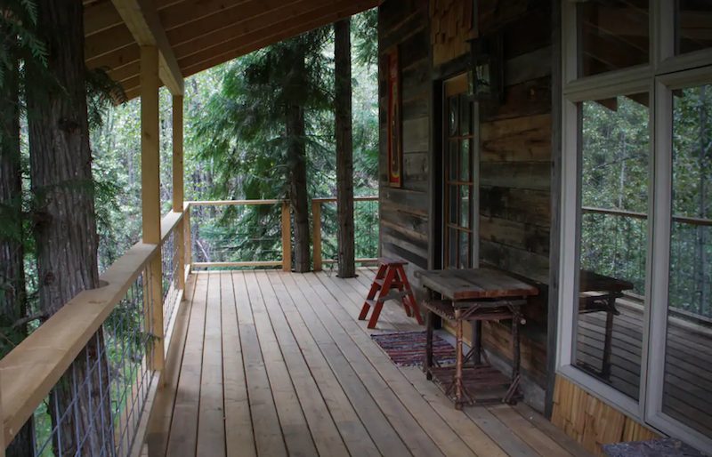 Escape To a Creekside Treehouse Nestled In The Woods Of B