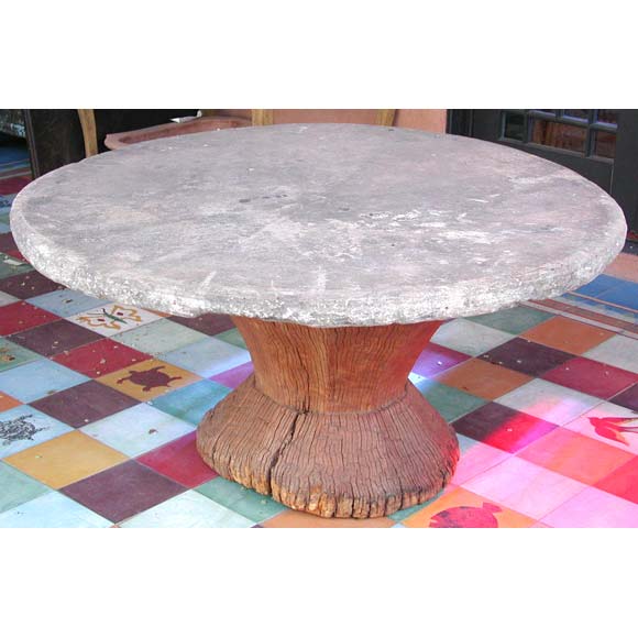 Stone top table with teak base For Sale at 1stDibs