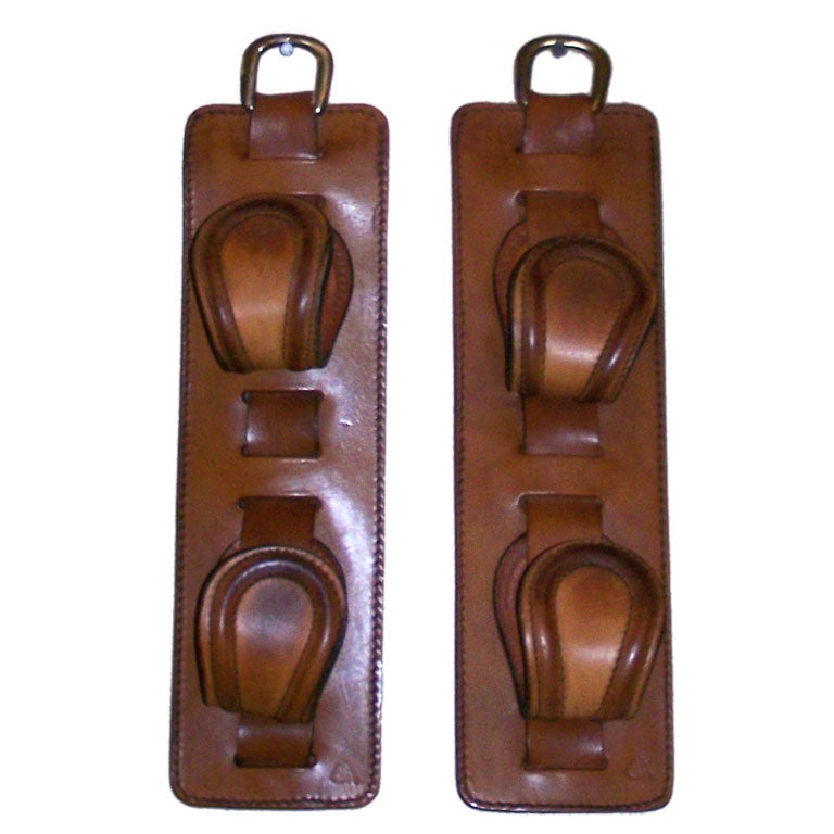 PAIR OF BROWN LEATHER COAT HOOKS at 1stdibs