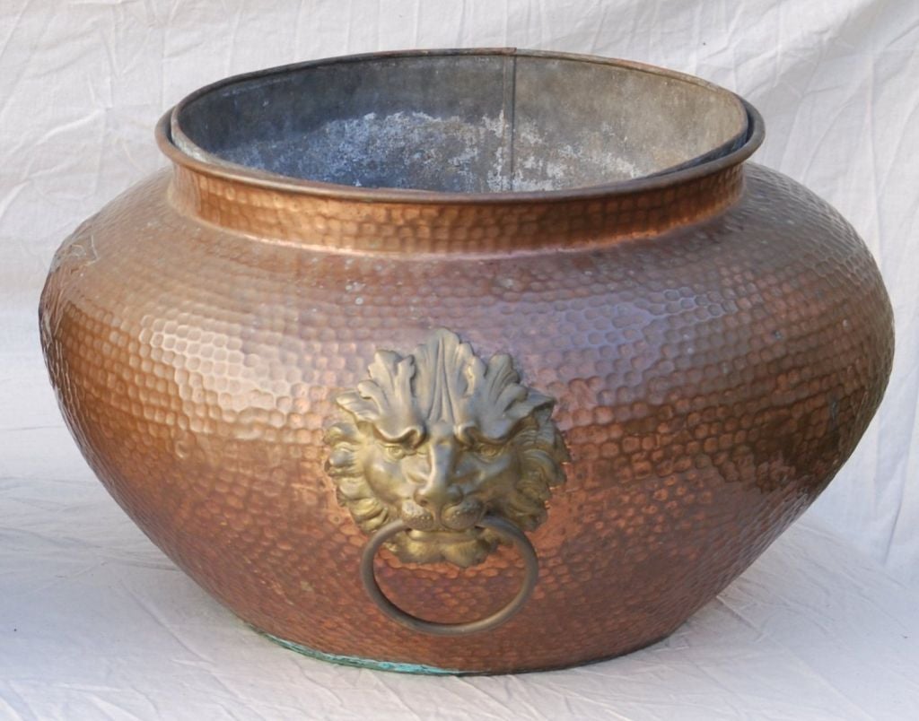 An Unusual Pair of Large Regency Hand Hammered Copper Planters For Sale