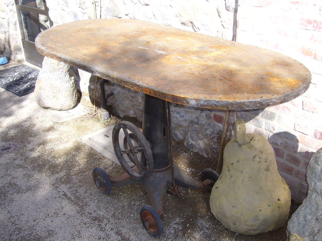 Oval Riveted Iron Table For Sale at 1stDibs
