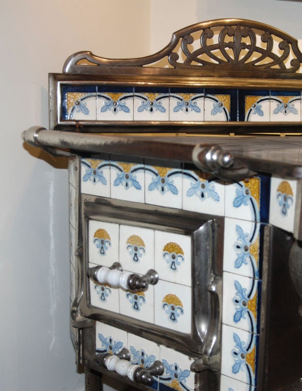 An Unusual Art Nouveau Cast Nickel and Porcelain Stove at 1stDibs art