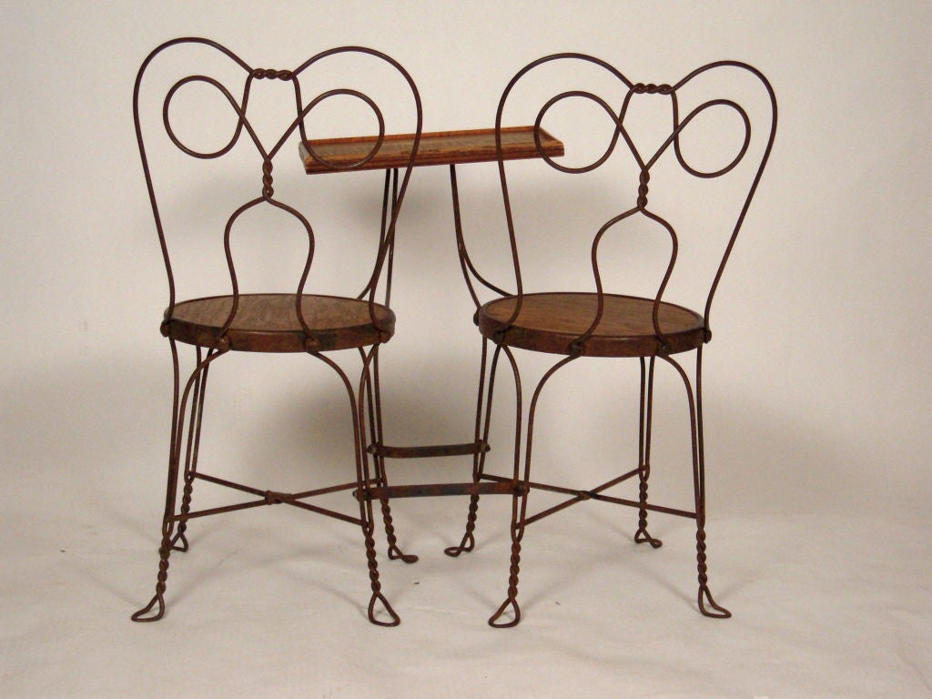 VINTAGE ICE CREAM PARLOR DOUBLE CHAIR WITH ATTACHED TABLE at 1stDibs