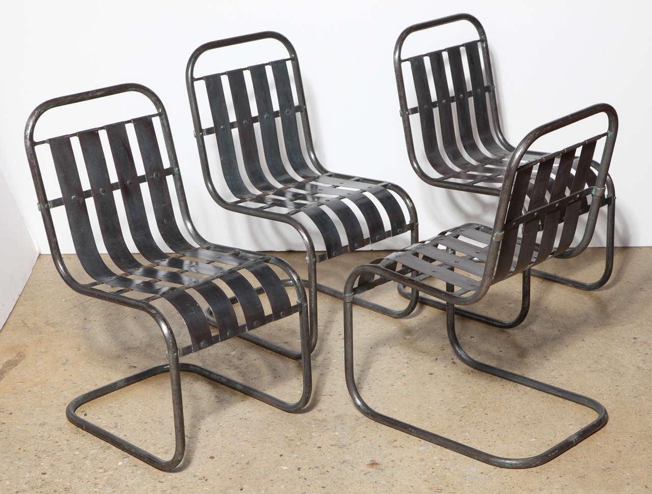 Set of Four Art Deco Steel Spring Rocker Side Chairs, circa 1930 at