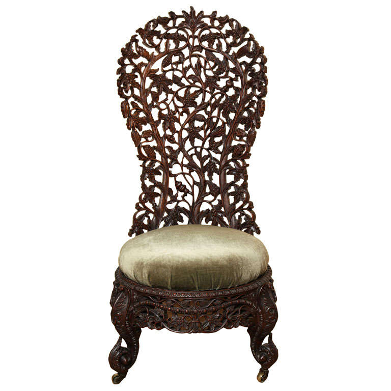 A Hand Carved Rosewood Burmese Slipper Chair at 1stDibs