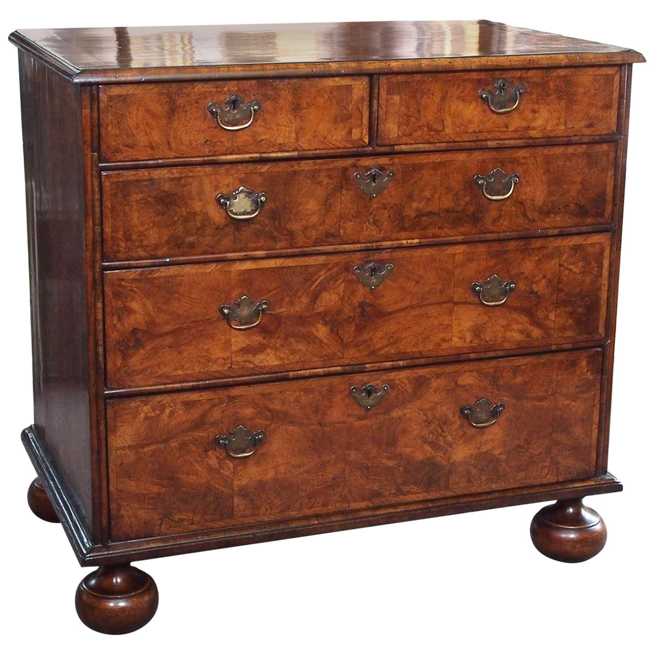 Rare William and Mary walnut chest of 5drawers crossbanded on bun feet. at 1stDibs