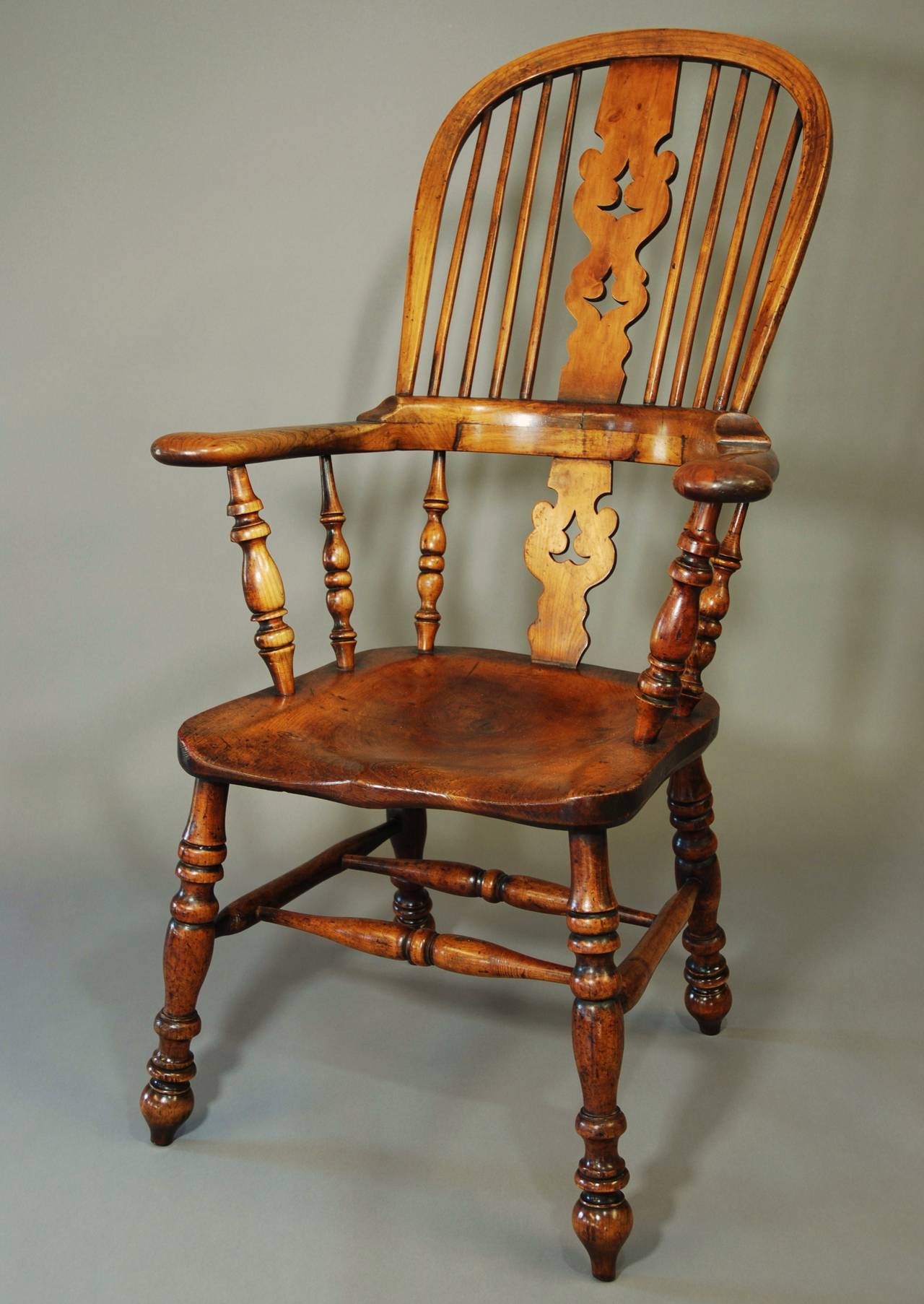 BroadArmed Fruitwood High Back Windsor Chair at 1stDibs