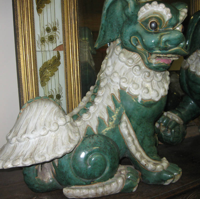 Late 19th century Pair of Glazed Porcelain Foo Dogs For Sale at 1stDibs