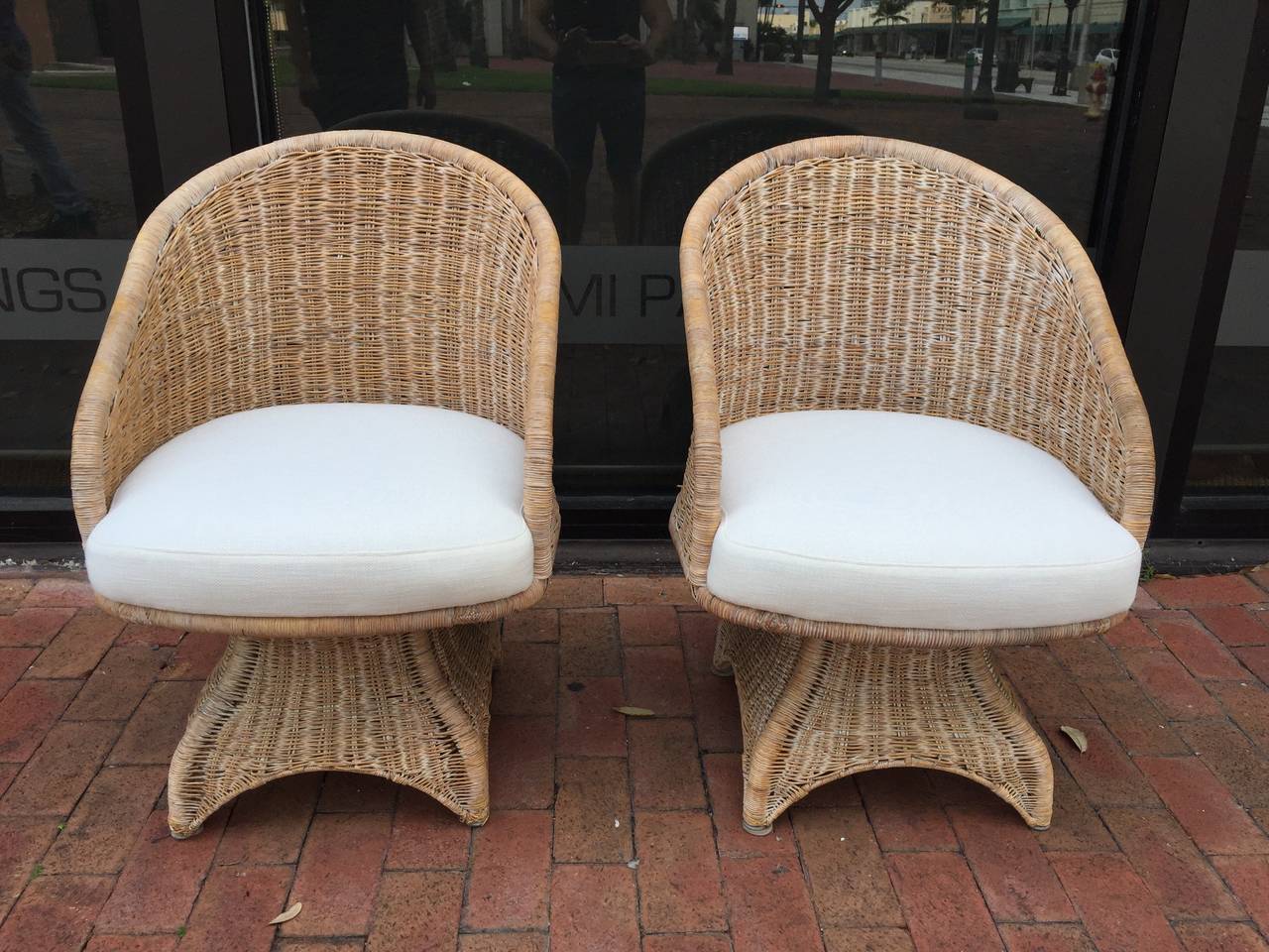 Curvaceous Pair of Vintage Wicker Swivel Chairs at 1stDibs