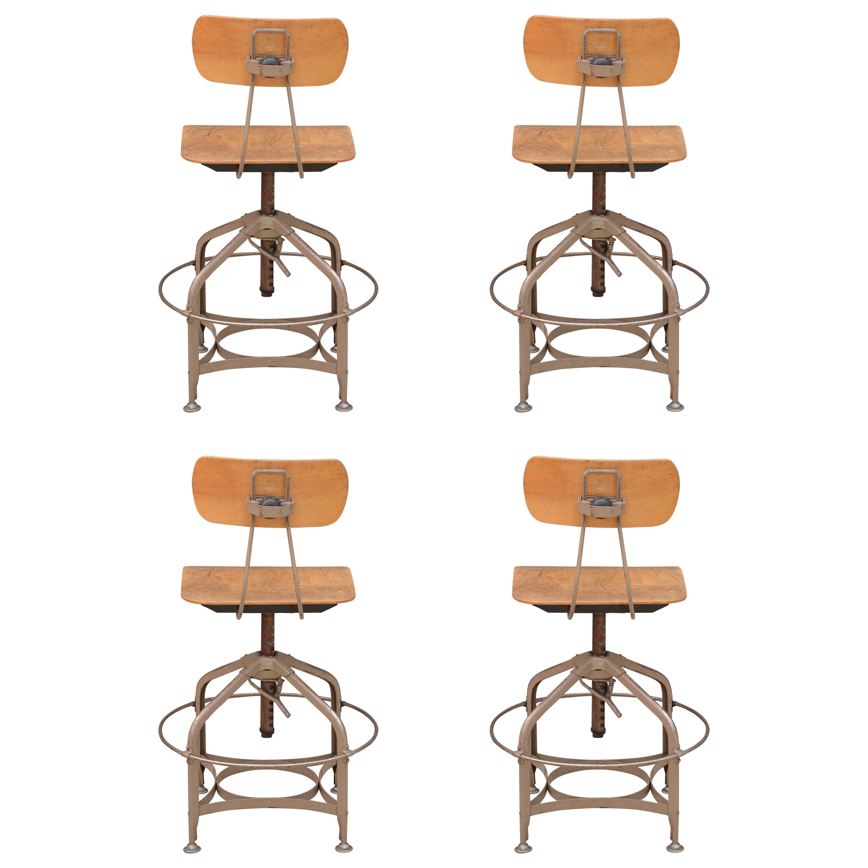 Rare set of 4 Vintage Adjustable Swiveling Toledo Bar Stools at 1stDibs