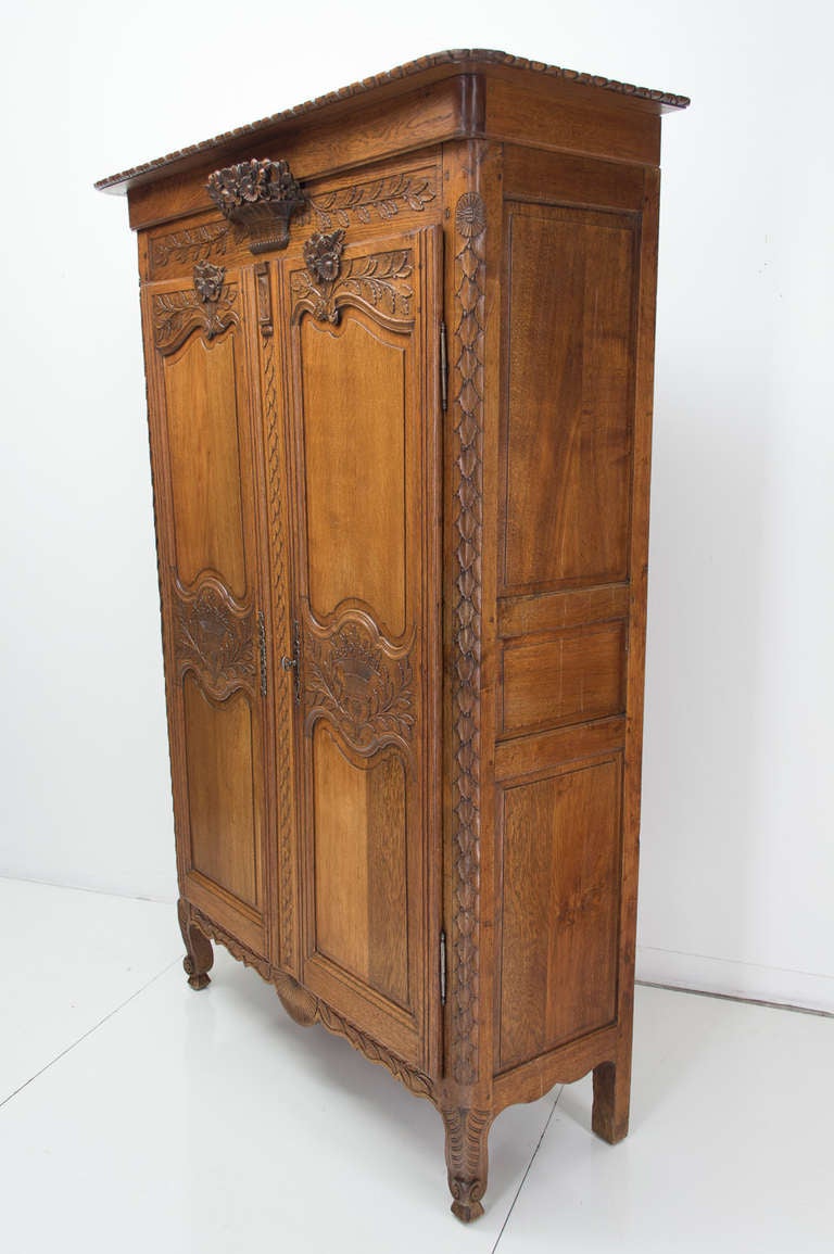 19th C. French Normandy Carved Armoire at 1stDibs