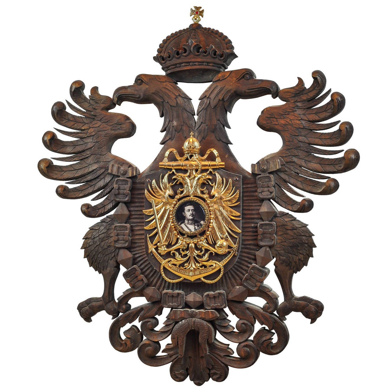 Carved Figural Coat of Arms and DoubleHeaded Eagle with Portrait in