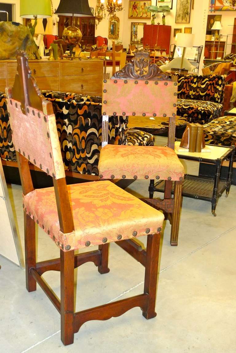 Pair of Carved Spanish Hall Chairs in Original Vintage Fortuny For Sale