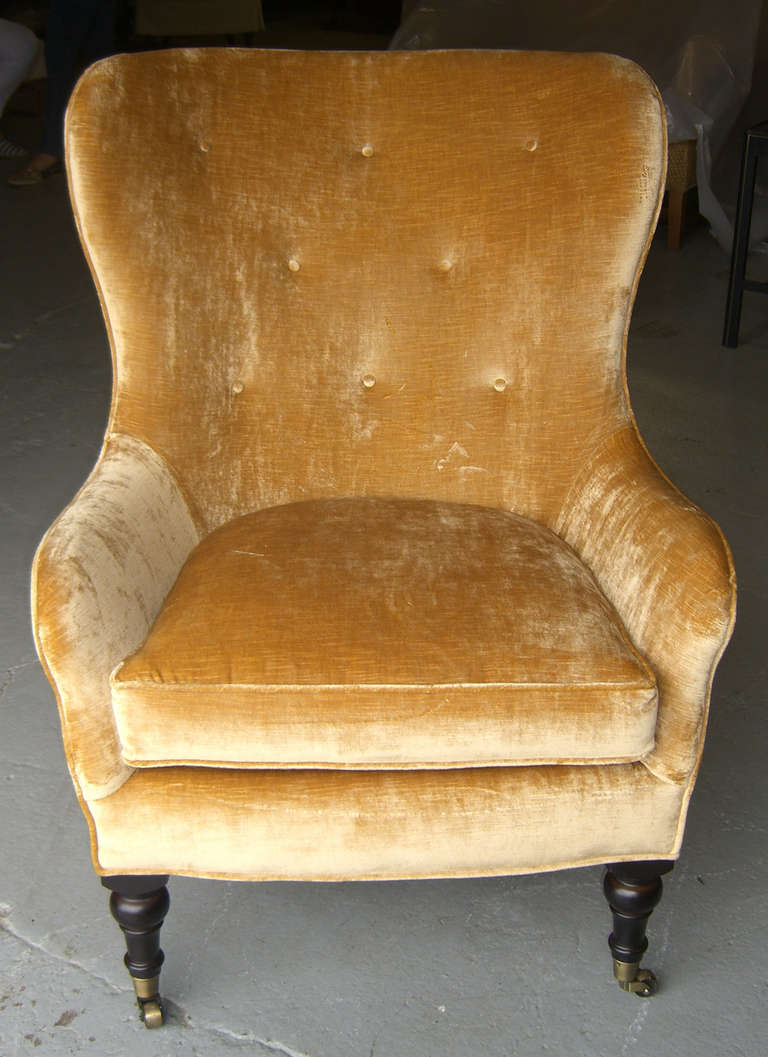 A Set of 4 Upholstered Wingback Chairs on Casters at 1stDibs wingback