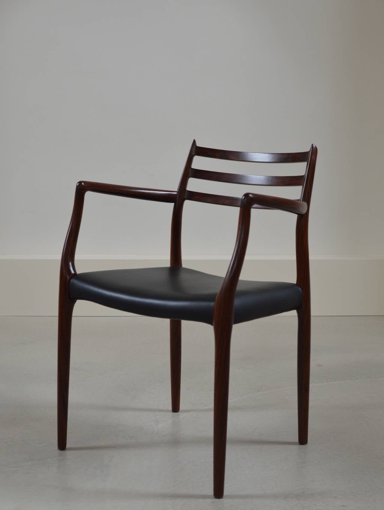 Rosewood and Black Leather Armchair by Niels O. Møller at 1stDibs