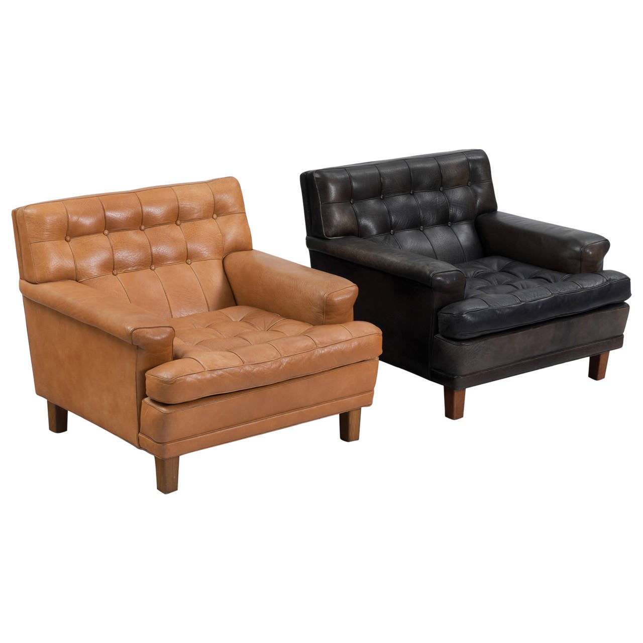 Arne Norell Pair of Easy Chairs in Black in Cognac Leather For Sale at