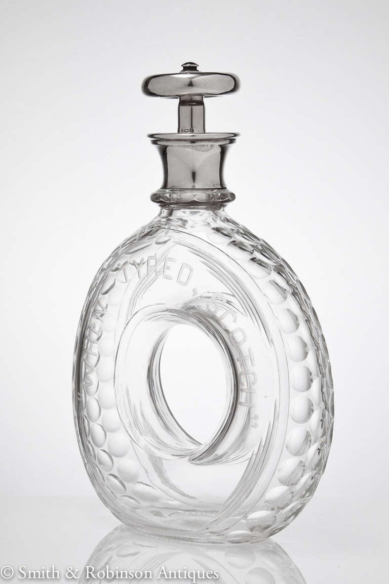 Novelty Silver and Glass Scotch Tyre Shaped Decanter, Birmingham 1907