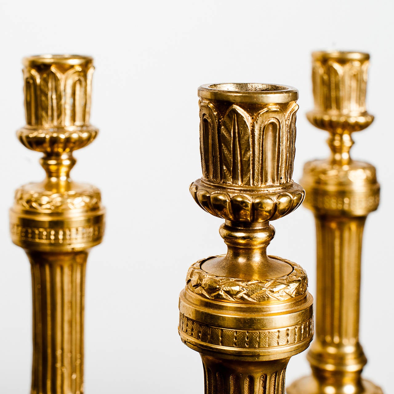 Set of Four Bronze Candlesticks at 1stdibs