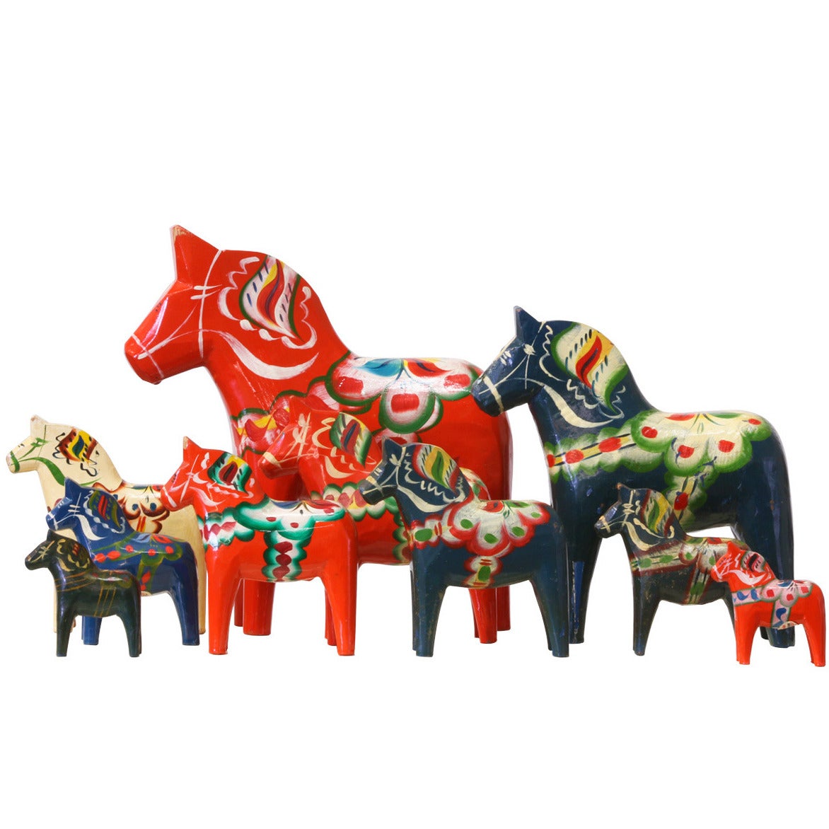 Swedish Herd of AssortedSize “Dala” Wood Toy Horses by Nils Olsson at