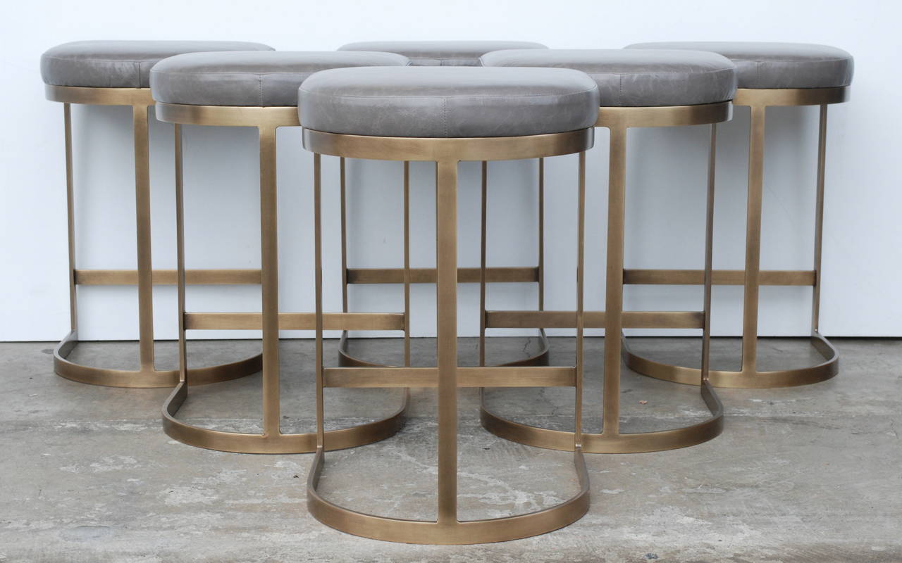 Milo Baughman Burnished Brass Bar Stools in Grey Leather at 1stDibs